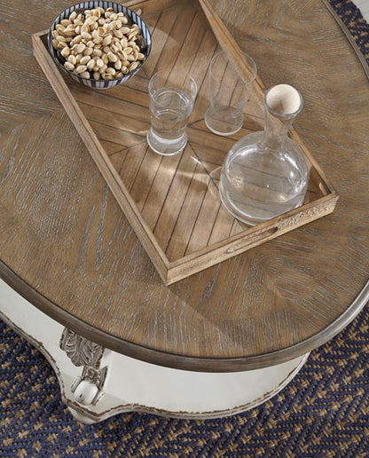 Realyn Oval Cocktail Table